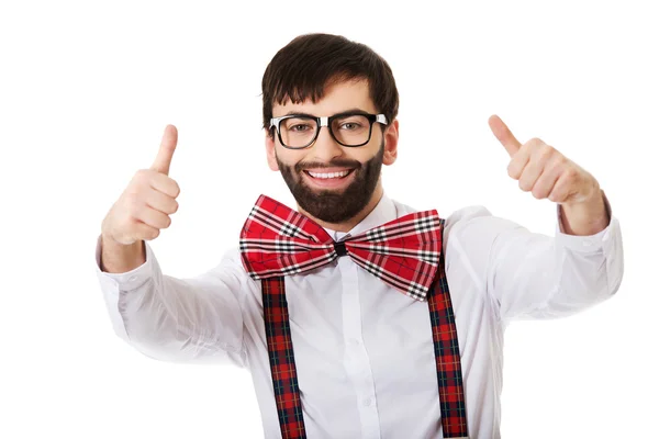 Man wearing suspenders with thumbs up. — Stock Photo, Image