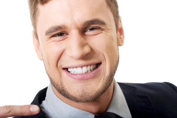 Happy businessman showing his white teeth. — Stock Photo, Image