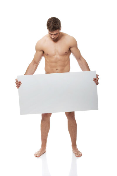 Young nude man covering his self with banner.