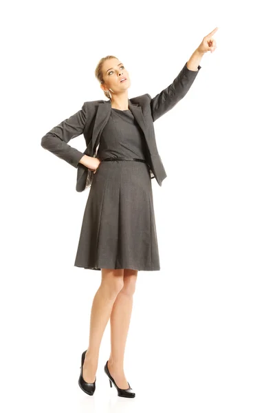 Businesswoman pointing high — Stock Photo, Image