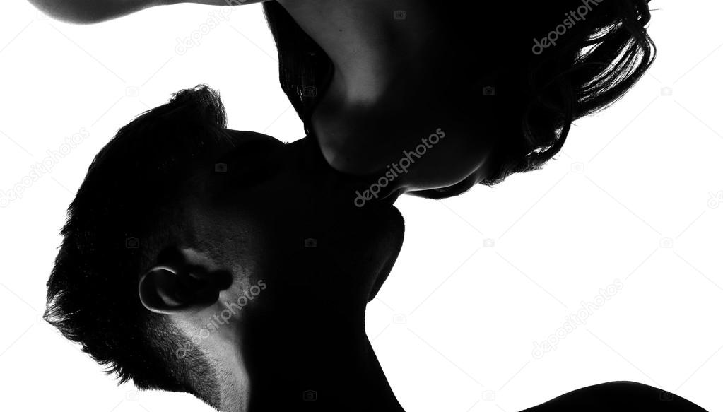 Man and a woman in love kissing