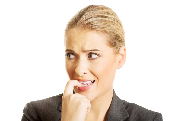 Mujer estresada mordiéndose las uñas —  Fotos de Stock