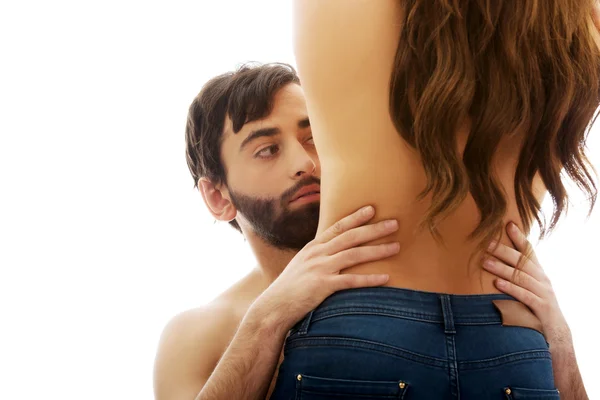 Man touching silm woman's waist. — Stock Photo, Image