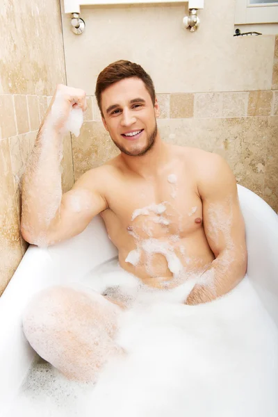 Handsome man taking a bath. — Stock Photo, Image