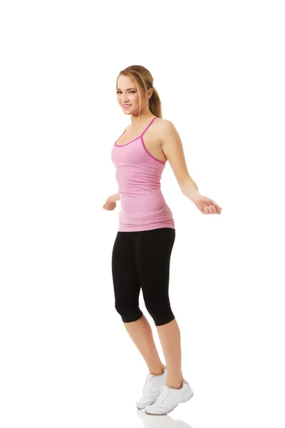 Young woman doing aerobic exercise. — Stock Photo, Image