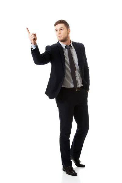 Uomo d'affari punta il dito verso l'alto . — Foto Stock