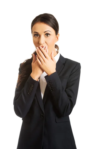 Businesswoman covering her mouth — Stock Photo, Image