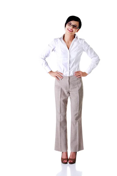 Full length businesswoman with hands on hips — Stock Photo, Image