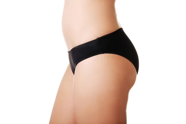 Vista laterale di donna magra glutei in lingerie — Foto Stock