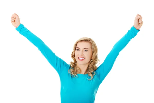 Portrait of a woman making winner gesture — Stock Photo, Image