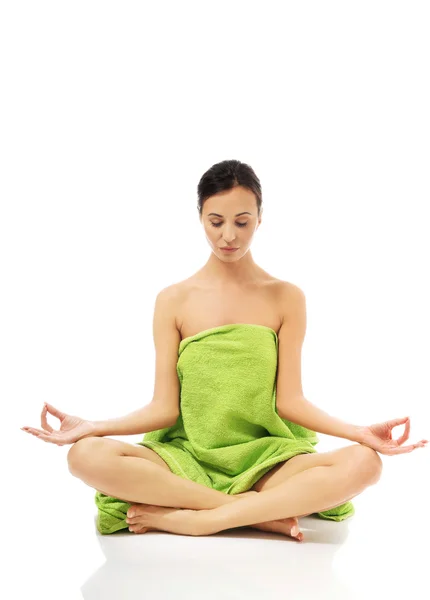 Front view woman sitting excercising yoga — Stock Photo, Image