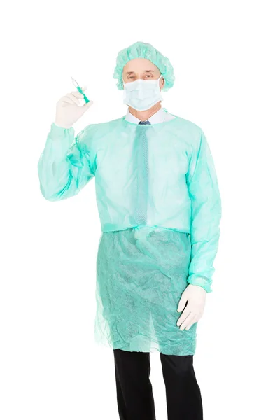 Male doctor holding a syringe — Stock Photo, Image