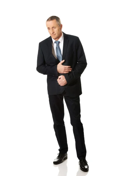 Businessman suffering from stomachache — Stock Photo, Image