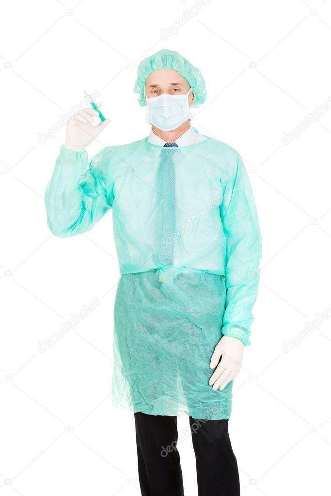 Male doctor holding a syringe
