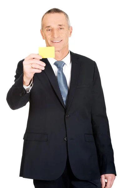 Businessman showing a name card — Stock Photo, Image