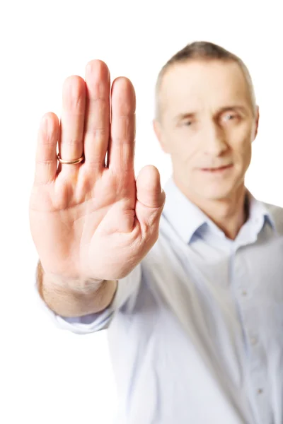 Man making stop sign with hand — Stock Photo, Image