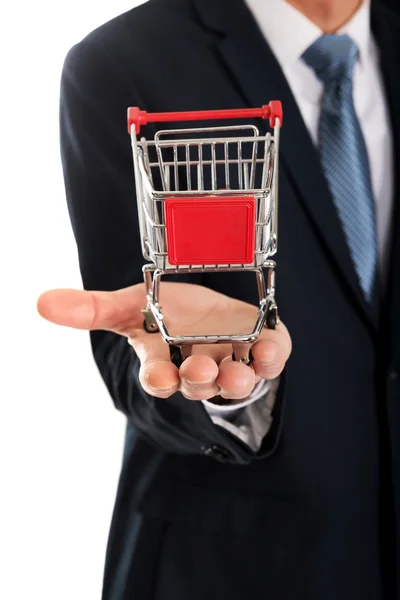 Hombre sosteniendo carrito de compras — Foto de Stock