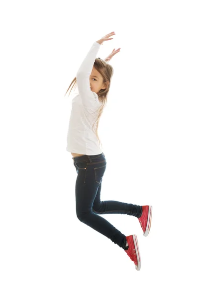Menina pulando com alegria — Fotografia de Stock