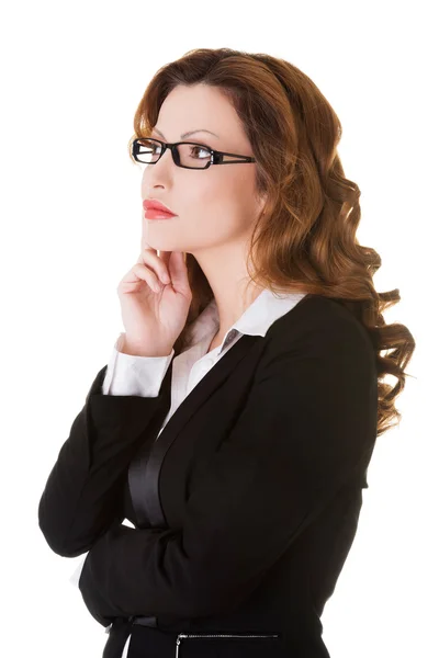 Thinking business woman looking up. — Stock Photo, Image