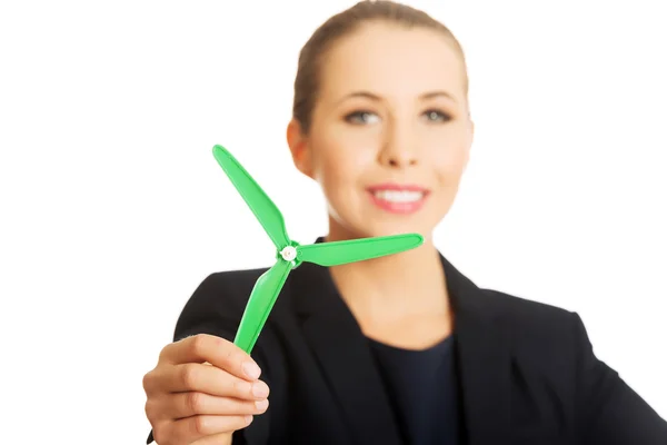 Businesswoman with windmill. — Stock Photo, Image