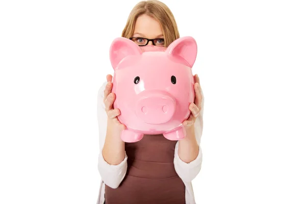 Woman holding piggybank — Stock Photo, Image
