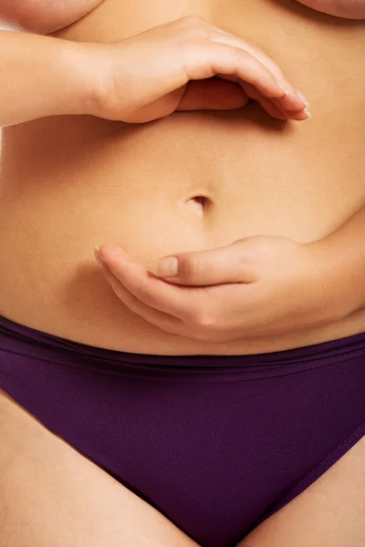 Vientre gordo de la mujer en ropa interior — Foto de Stock