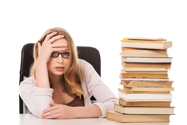 Woman with stack of books Stock Picture