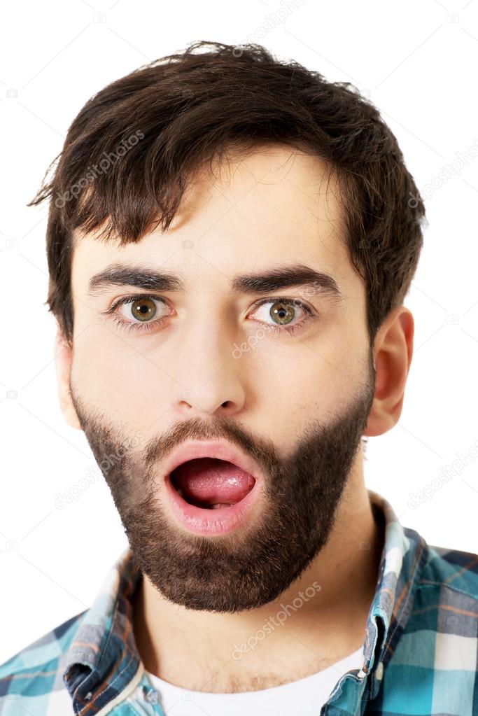 Shocked man with mouth open.