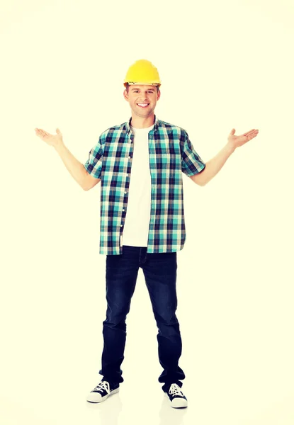 Trabajador feliz presentando espacio de copia . — Foto de Stock