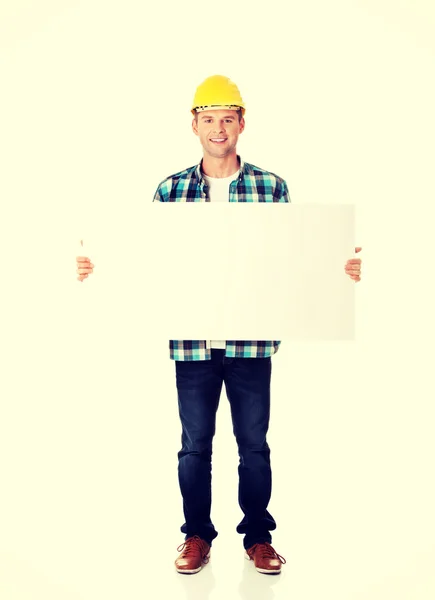 Worker presenting empty banner. — Stock Photo, Image