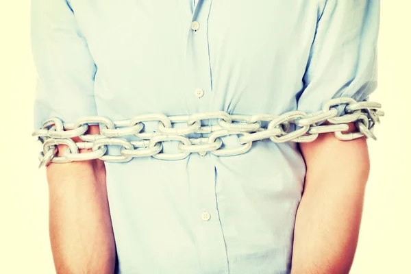 Businessman tied up with chain — Stock Photo, Image