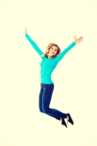 Casual woman jumping — Stock Photo, Image