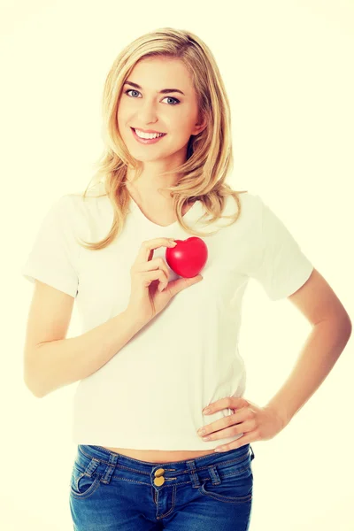 Smiling woman with red heart — Stock Photo, Image