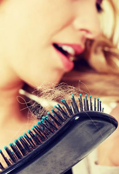 Woman loosing hair — Stock Photo, Image