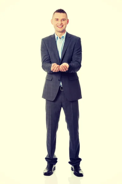 Businessman showing copy space — Stock Photo, Image