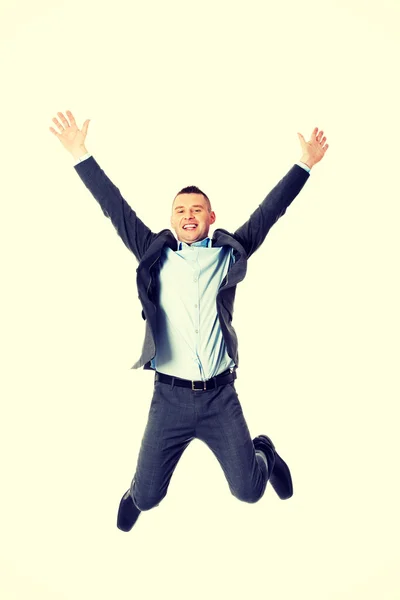 Businessman jumping in air — Stock Photo, Image