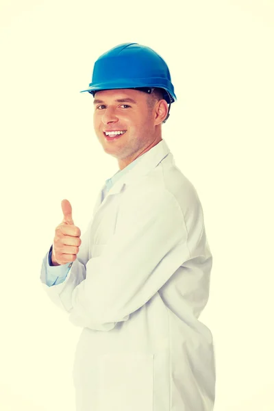 Man in a lab coat gesturing thumb up sign — Stock Photo, Image