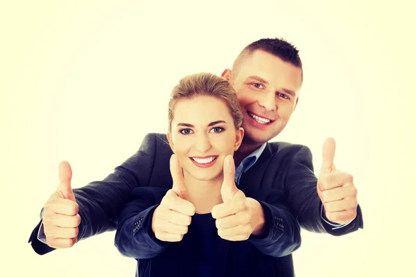 Obchodní pár ukazuje palec nahoru znamení — Stock fotografie