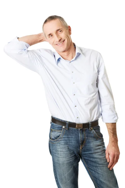 Good looking man touching his head — Stock Photo, Image