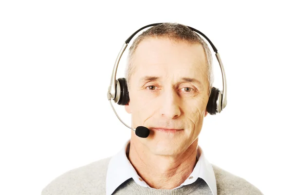 Call center homem usando fone de ouvido — Fotografia de Stock