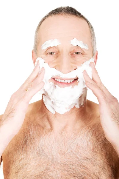 Mature man applying shaving foam — Stock Photo, Image