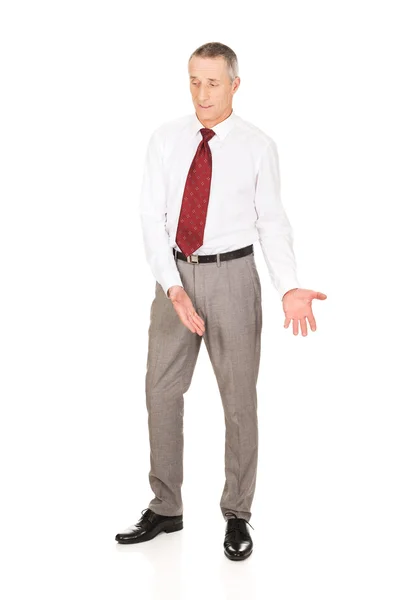 Man showing copyspace on the floor — Stock Photo, Image