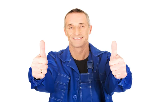 Repairman showing thumbs up sign — Stock Photo, Image