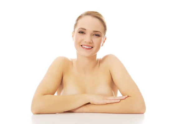 Beautiful young spa woman by a desk. — Stock Photo, Image