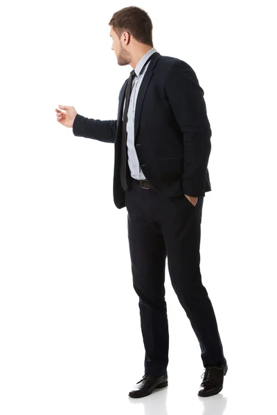 Businessman showing copy space. — Stock Photo, Image