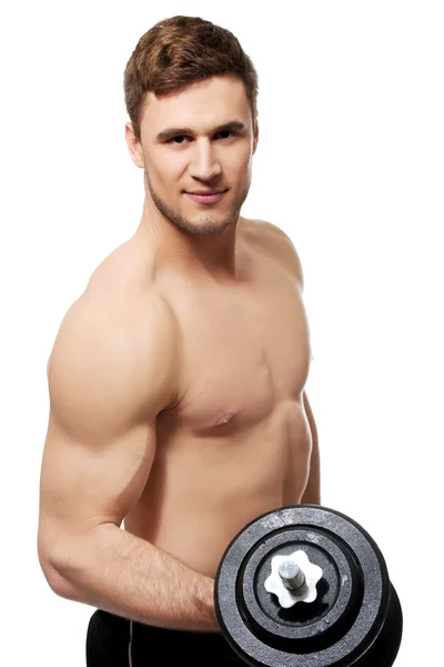 М'язистий чоловік тренується з вагами .. — стокове фото