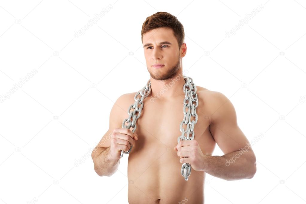 Well build male model with chains over his neck.