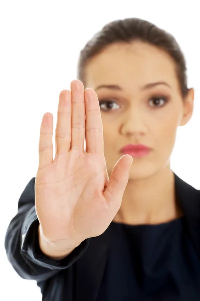 Vrouw maakt stopbord. — Stockfoto