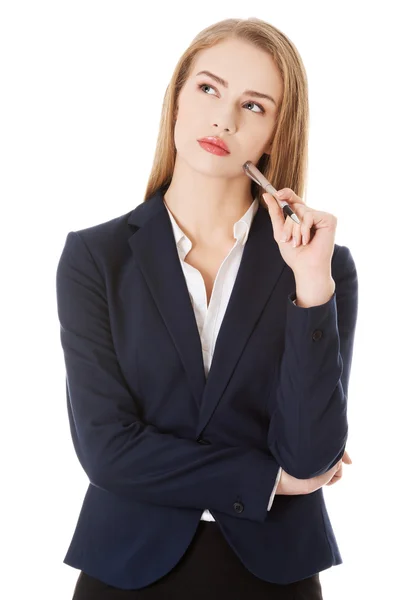 Businesswoman thinking about an idea — Stock Photo, Image