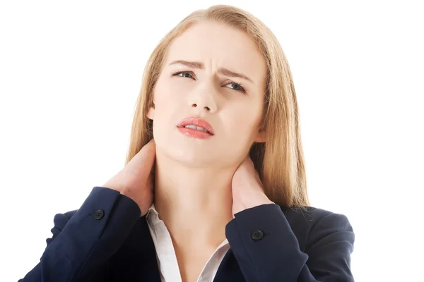 Businesswoman with neck pain — Stock Photo, Image